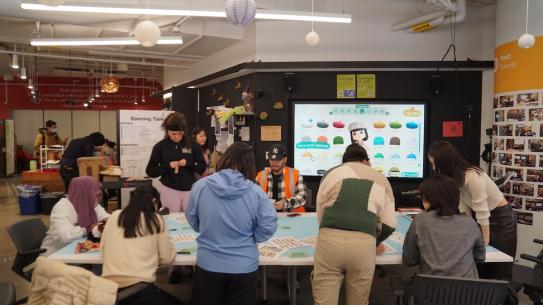 group of students working on a project in MAkerspace